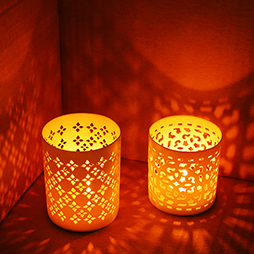 Lantern casts shadows on wall