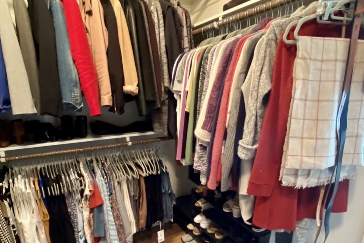 Closet with clothes and shoes