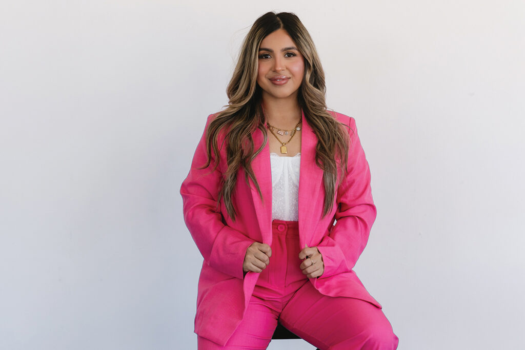 Role Model Bri Aguilar in a pink suit