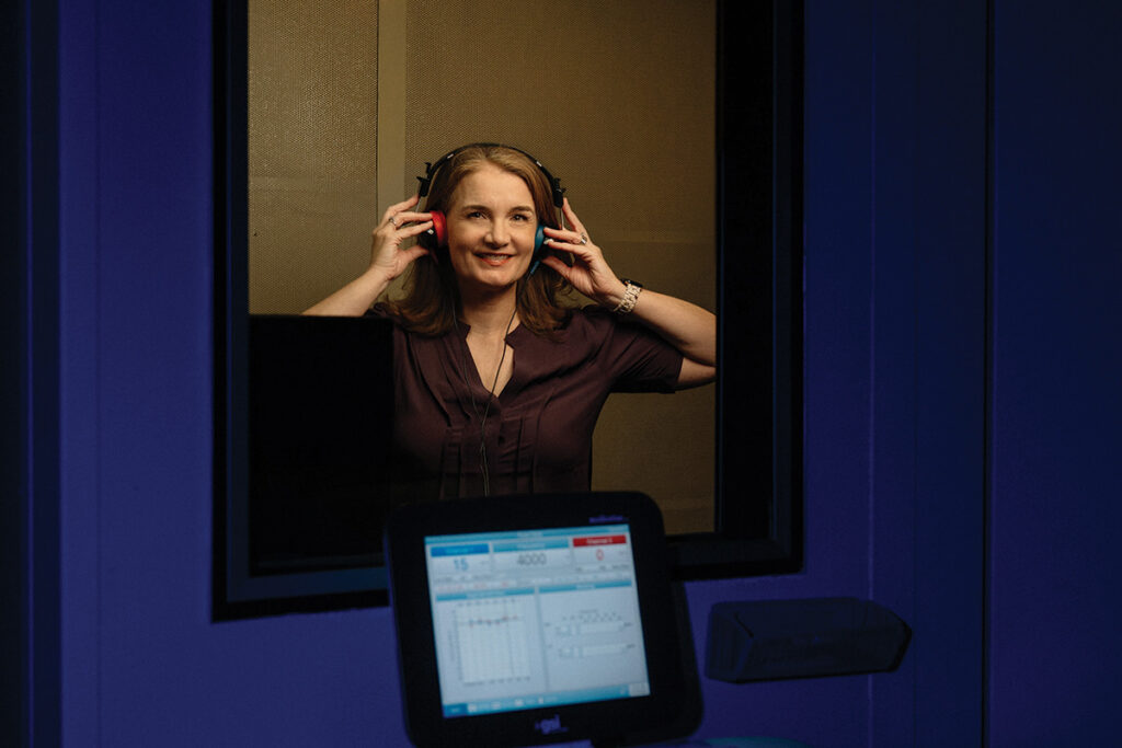 Person in Audicles Hearing booth